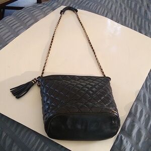Black quilted leather crossbody  bag with chain link strap